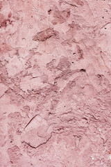 Abstract background concrete painted pink paint, weathered with cracks and scratches. Landscape style. Grungy Concrete Surface. Great background or texture