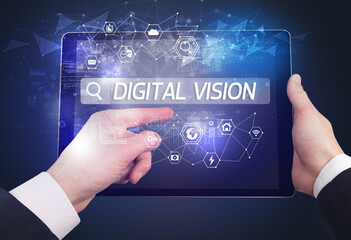 Close-up of a tablet searching DIGITAL VISION inscription, hi-tech computing concept