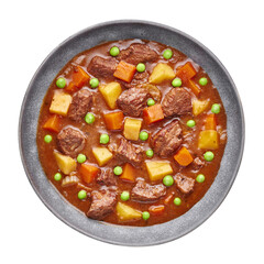 Irish Beef Stew in matt gray bowl isolated on white background. Stew with beef or lamb meat with potatoes, carrots, peas and herbs. Traditional american and european food. Dinner meal. Copy space