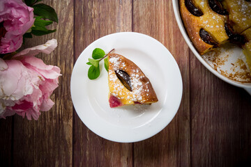 sweet homemade casserole with fruits inside in a plate