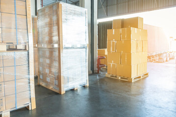 Large shipment pallets goods in interior warehouse storage. shipment cargo export. Warehouse industry shipping logistics.