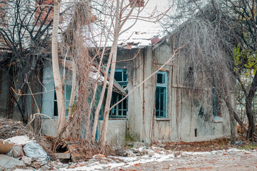 Neglected ruined and destroyed building slowly falling apart