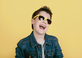 happy and smiling boy with sunglasses