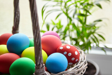 Easter Day, basket with colorful Easter Eggs