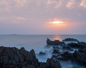 Naklejka premium sunset over the sea in Guernsey 