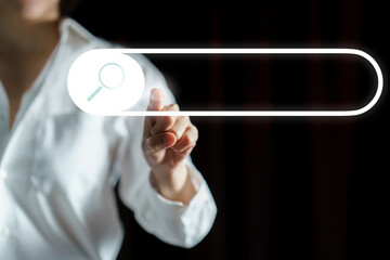Hand clicking internet search engines  symbol on computer touch screen