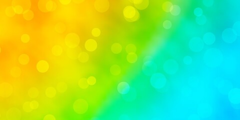 Light Blue, Yellow vector pattern with spheres. Glitter abstract illustration with colorful drops. Pattern for business ads.