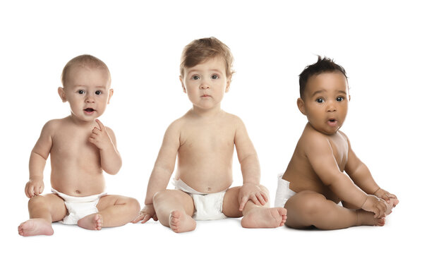Collage with photos of cute babies in diapers on white background