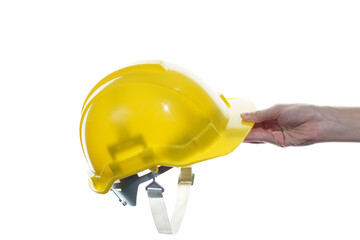 Woman hand holding  yellow safety helmet isolated on white background.