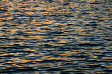 Colorful beautiful sunset on sea summer orange background