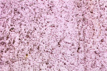 Abstract background concrete painted pink paint, weathered with cracks and scratches. Landscape style. Grungy Concrete Surface. Great background or texture.