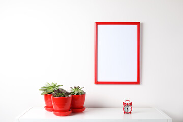 Mock up poster in the interior. White empty canvas with red border isolated on white background with copy space