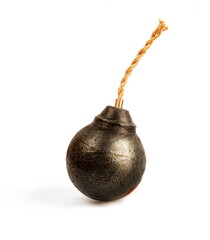 classic round black antique bomb with a non-burning rope wick isolated on a white background