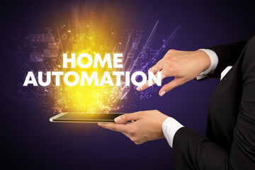 Close-up of a touchscreen with HOME AUTOMATION inscription, innovative technology concept