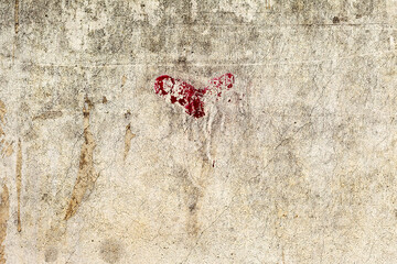 Dirty concrete wall with streaks of water, stains, cracks and scratches. Grungy concrete surface....