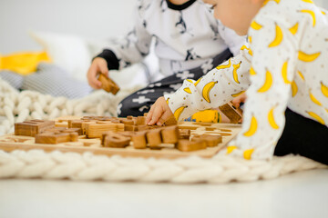 Children playing with blocks. Close-up.