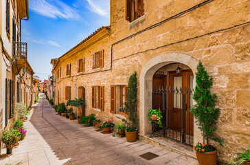 Fototapeta na wymiar Beautiful street in the old town of Alcudia, Majorca, Spain, Balearic Islands, Mallorca, Europe