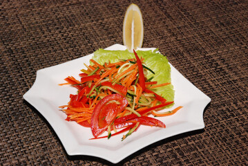 pickled salad with carrot, cucumber and tomatoes