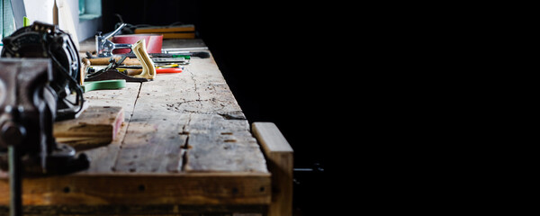 Tools on the workbench of the old workshop