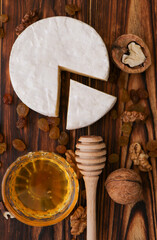 Camembert cheese sliced ​​with a delicate texture