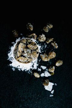 Salted capers. Creative feed