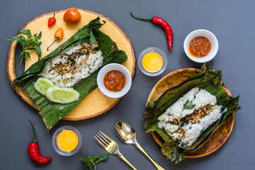 Organic roasted rice wrapped in banana leaves.