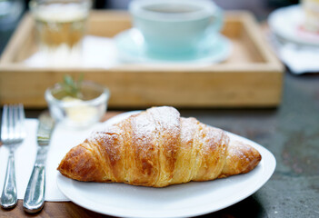 croissant and cup of coffee