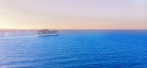 Cruise ship in blue sea. Aerial view photo