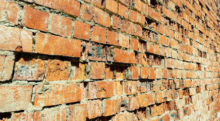 Obraz premium old red brick wall with destruction backgrounds, textures