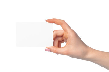 Obraz premium Woman's hand with blank white business card isolated on white