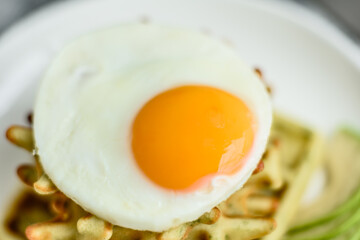 Fresh delicious and nutritious breakfast with waffles with spinach