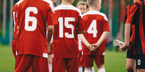 Horizontal Background of Youth Sport Team. Boys in Two Football Teams Initial Greeting. Children in...