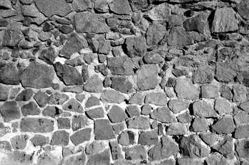 Old stone wall texture.  black and white