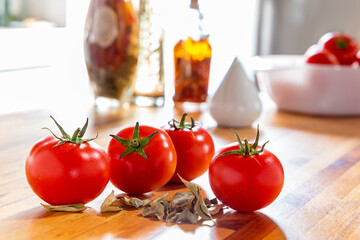 grouped tomatoes in kitchen preparation