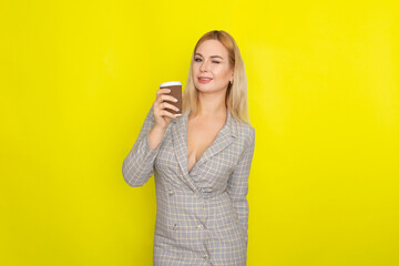 Business blonde woman with cup of coffee