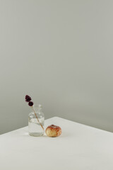 Minimal still life whit fruit and flowers