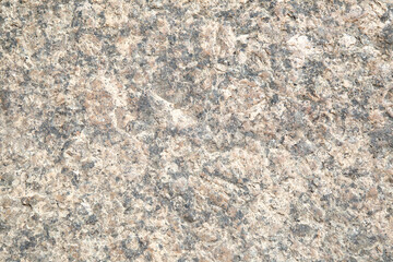 Motley granite surface, texture background.