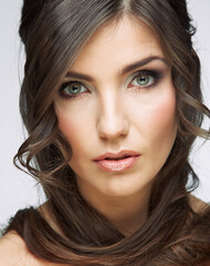 Naklejka premium young woman with long curly hair