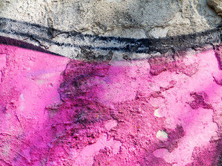 Fototapeta premium Landscape style. Grungy concrete surface with cracks, scratches traces of different colors paint on the walls. Great background or texture.