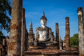 Fototapeta na wymiar Wat Mahathat, Sukhothai old city, Thailand. Ancient city and culture of south Asia.