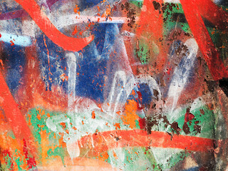 Landscape style. Grungy concrete surface with cracks, scratches traces of different colors paint on...