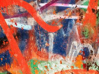 Landscape style. Grungy concrete surface with cracks, scratches traces of different colors paint on...
