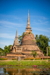 Fototapeta premium Wat Mahathat, Sukhothai old city, Thailand. Ancient city and culture of south Asia.
