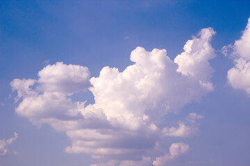 blue sky background with tiny clouds