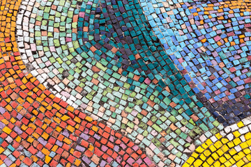 Old diagonal colorful mosaic texture on the wall