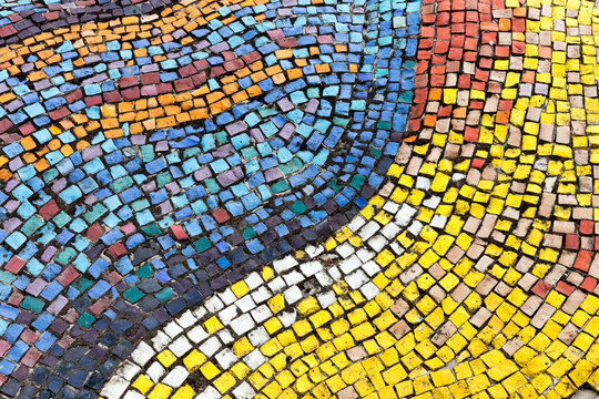 Old diagonal colorful mosaic texture on the wall