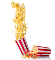 Set of flying popcorn from paper bucket and scattered popcorn isolated on white