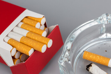 Close up cigarette in pack is addictive to be cancer.smoking reduction campaign in World No Tobacco Day.