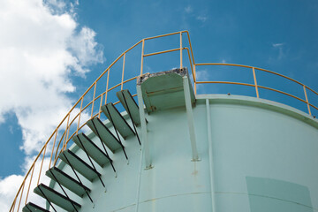 stairway to sky iron staircase beside the water tank 