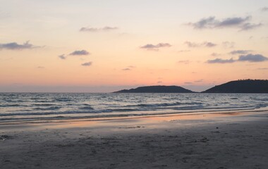 Sunset beautiful golden yellow. Beach, sea, sandy beach. On twilight.